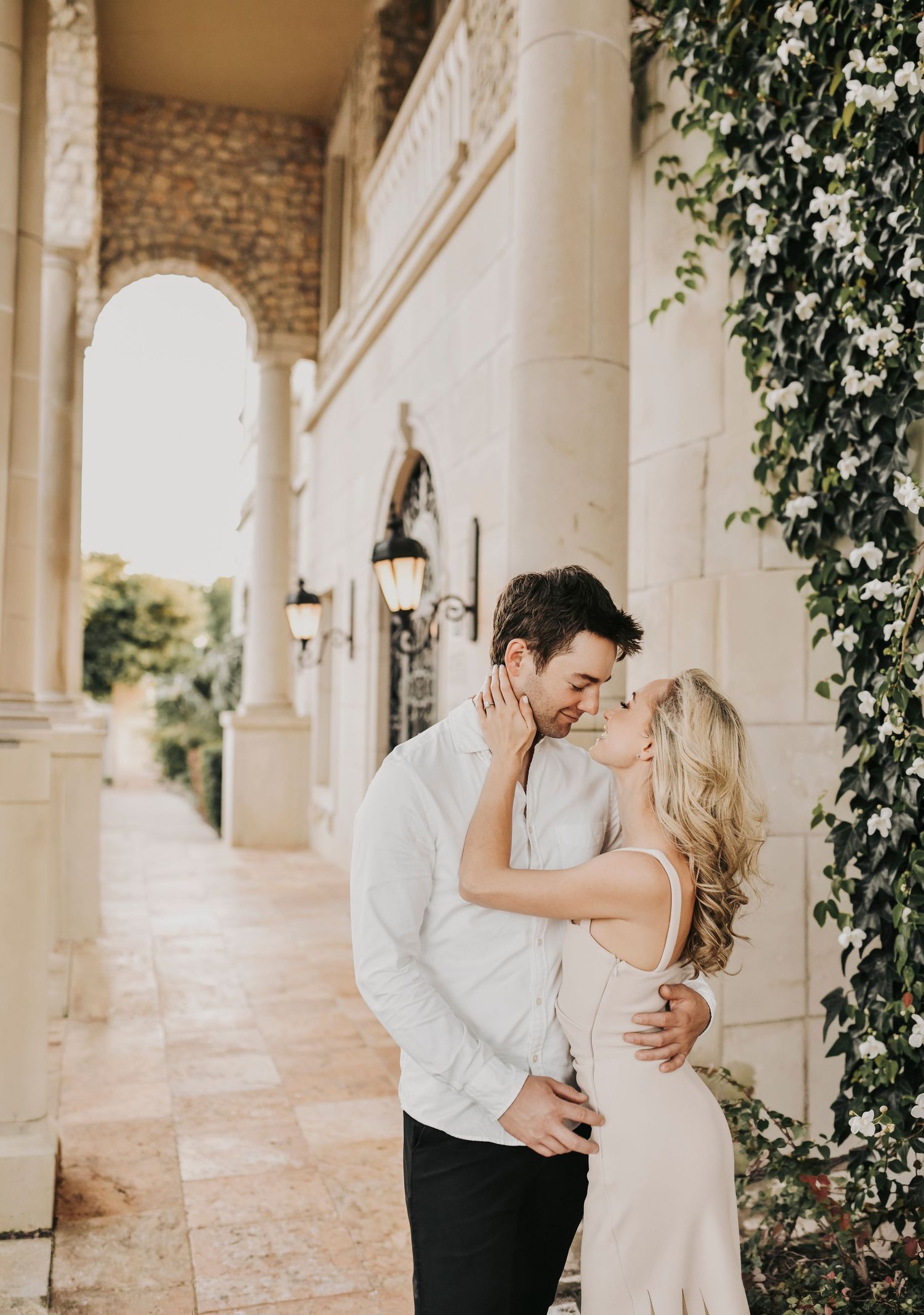 a couple poses romantically at adriatica village