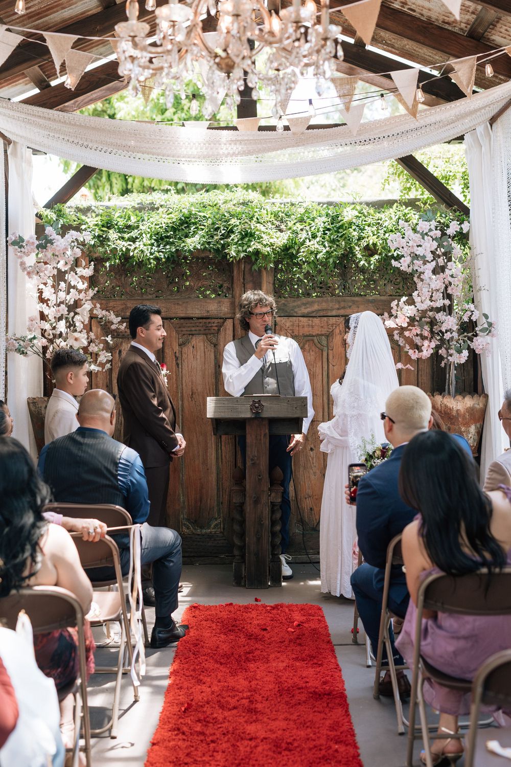 old brown house in los angeles hosts wedding ceremony for alternative intimate couple, film wedding photography
