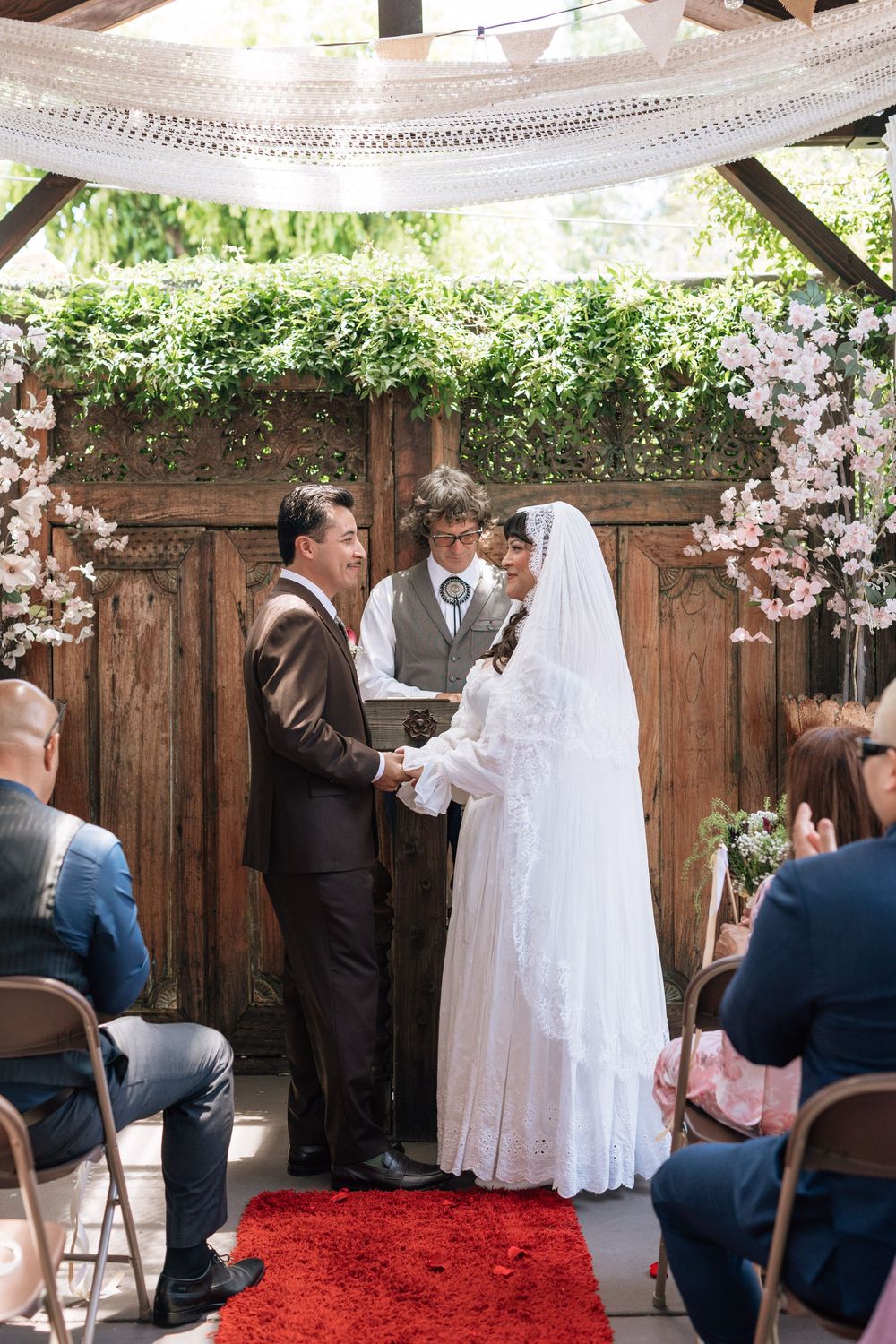 couple sharing vows at los angeles intimate wedding in highland park, film wedding photography