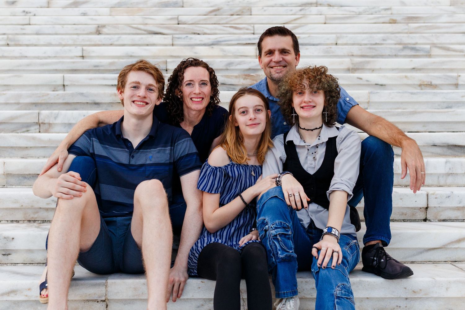 Family portrait taken on the steps of the capitol building in San Juan, Puerto Rico.