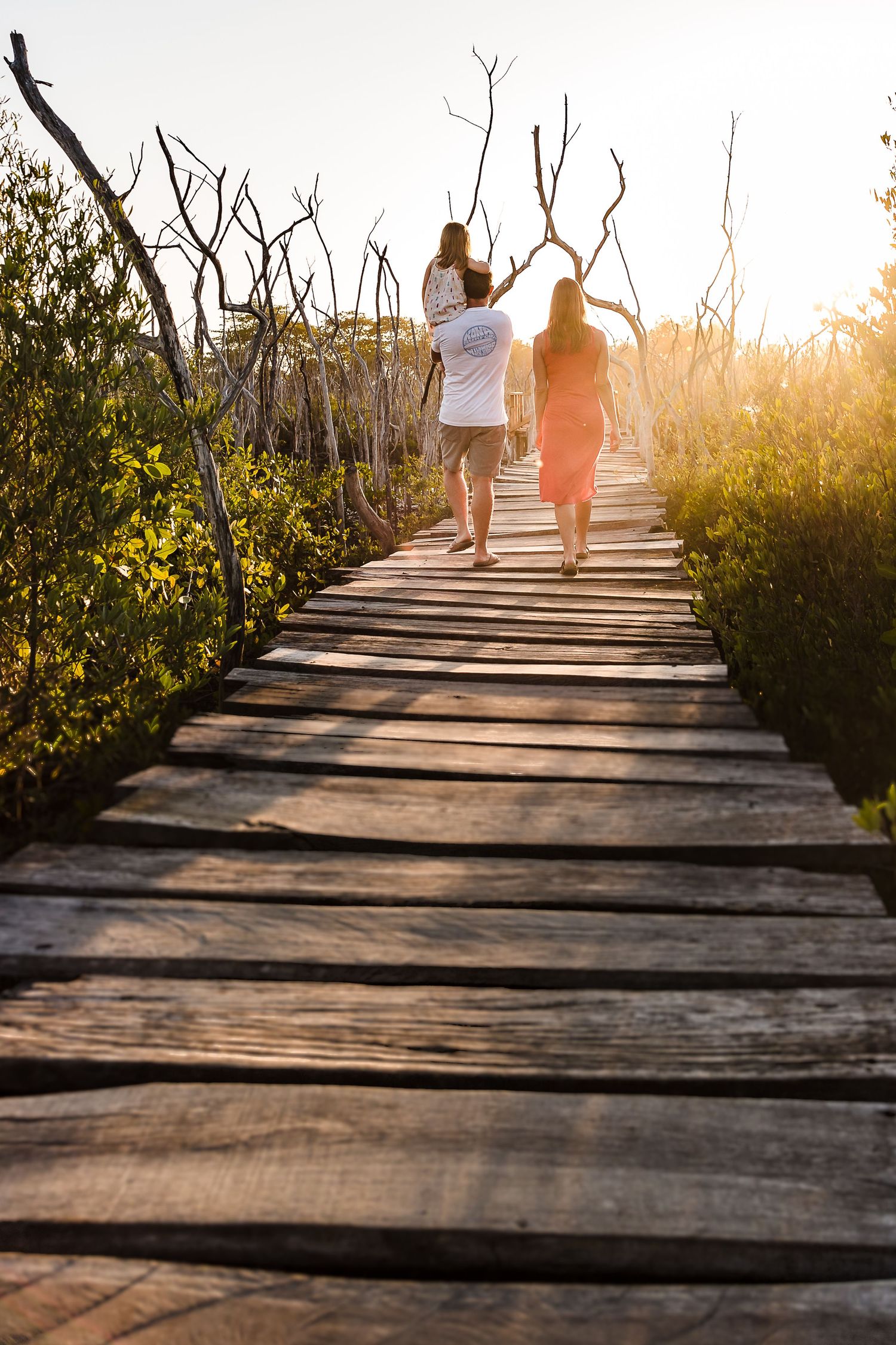 tamarindo golden hour lifestyle photographer at the Avellanas beach mangrove bridge