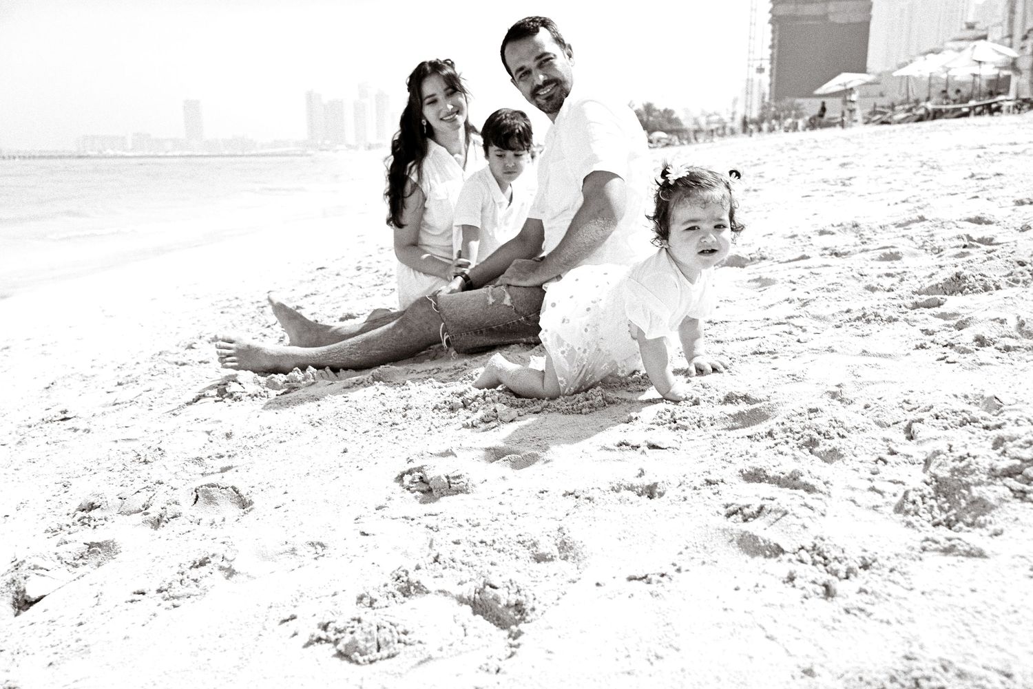 family is resting near the sea