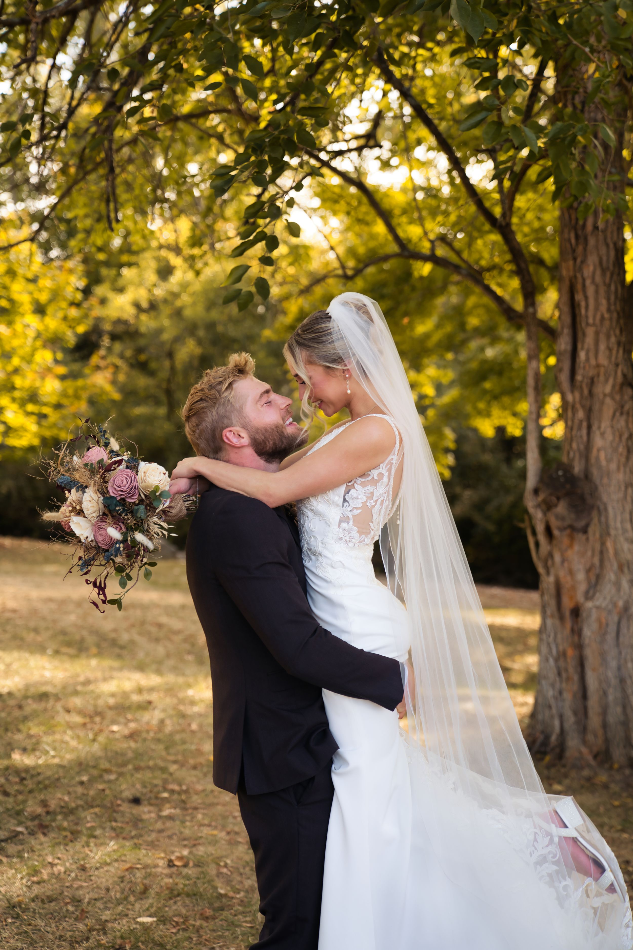 Bride & Groom couple's portraits on the wedding day in Miamisburg Ohio at golden hour sunset in the fall - Cincinnati Wedding Photographer
