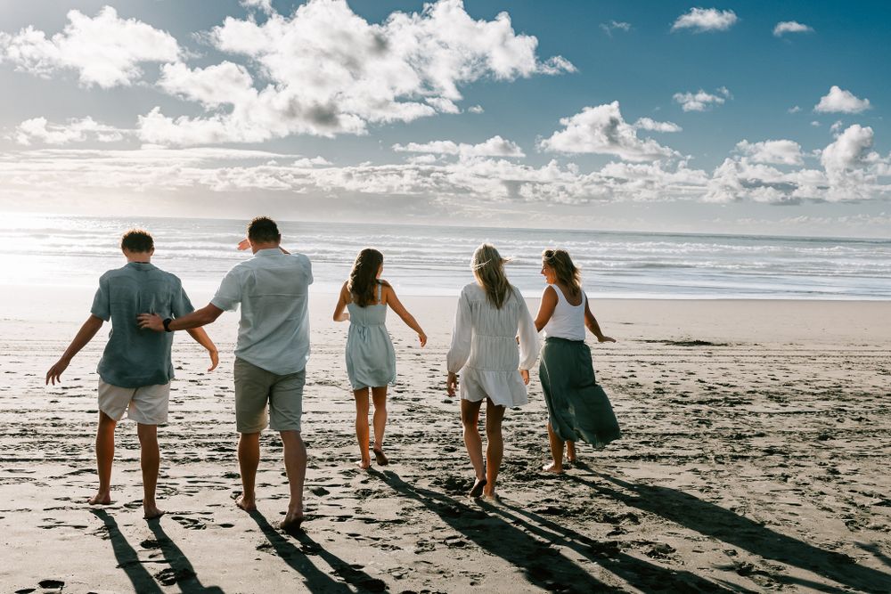 family photo on a beach in sunset