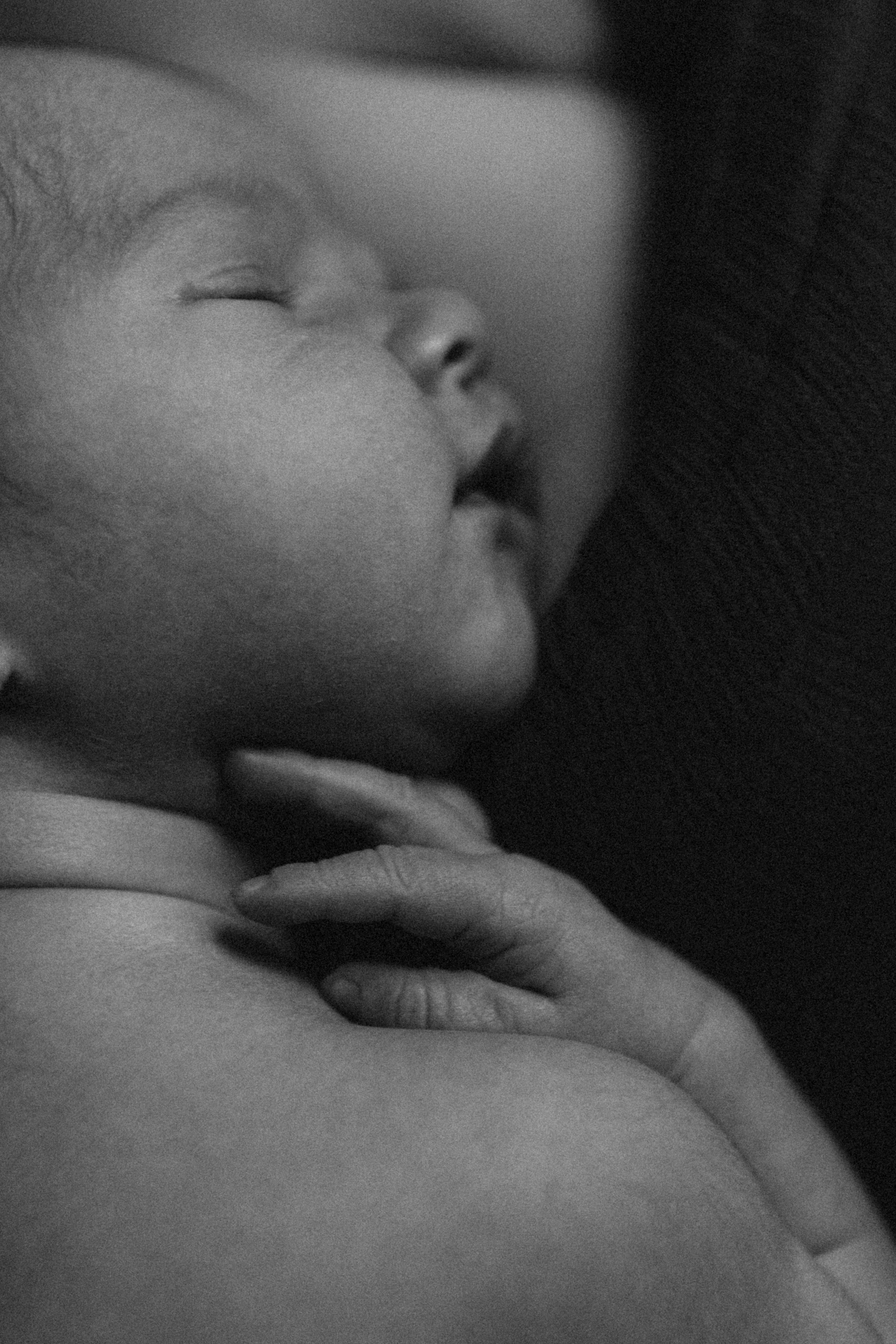 a  new born during a new born photo session with Forever Ours Photography in Kent