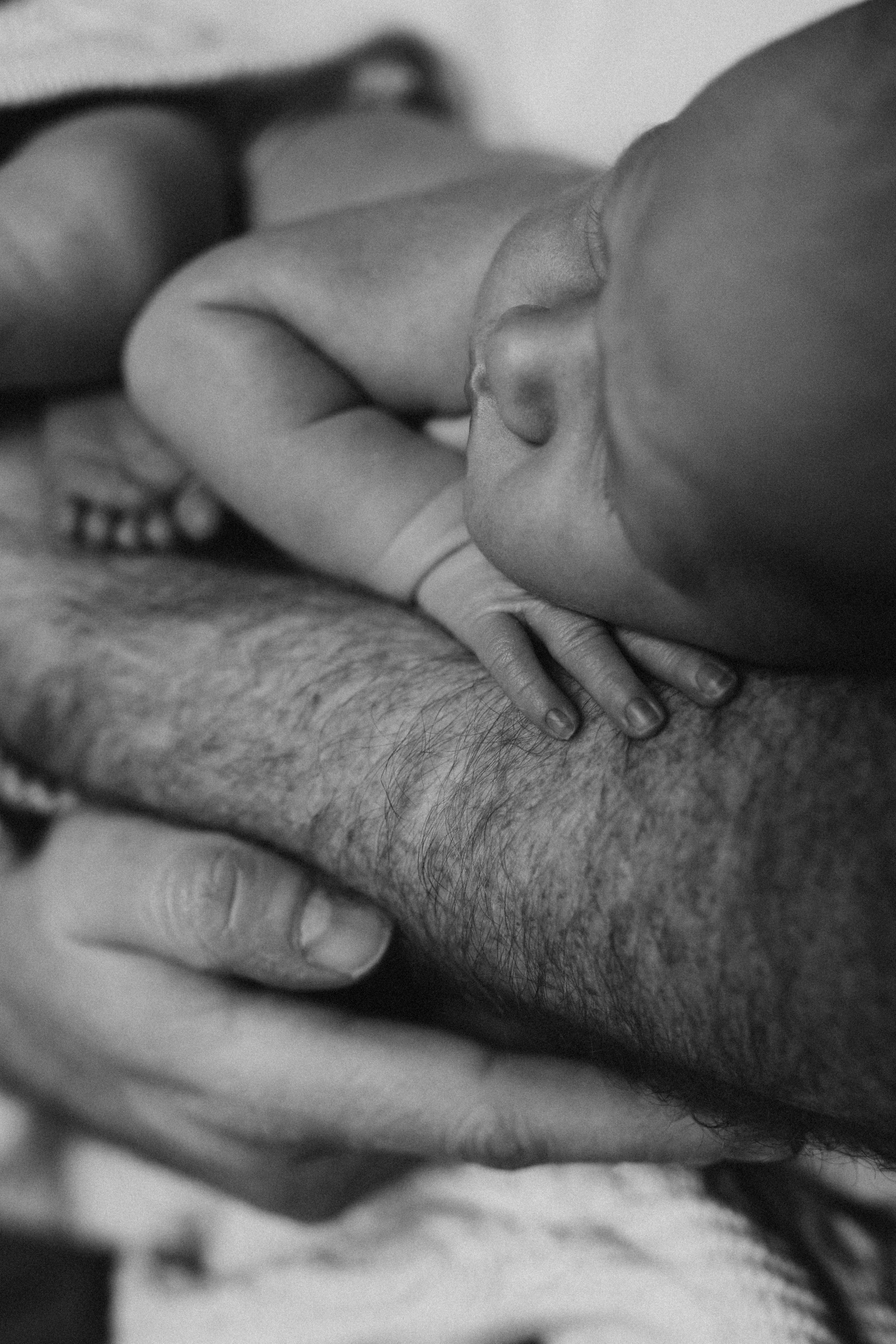 a new born during a new born photo session with Forever Ours Photography in Kent