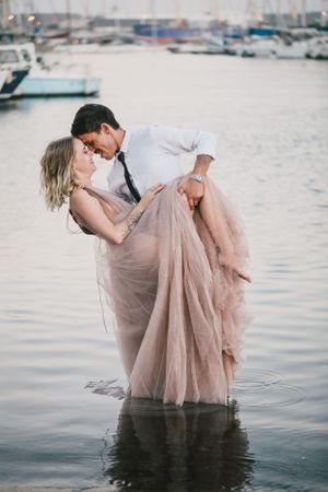 couple posing in water