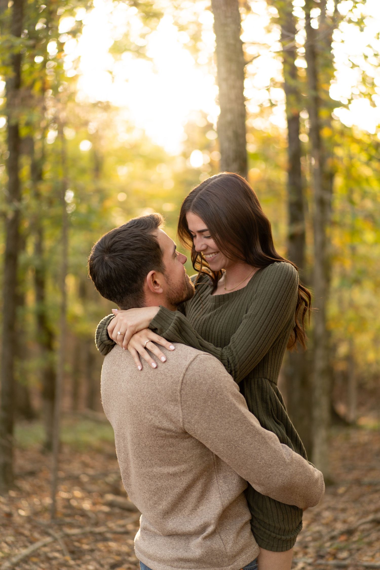 Young couple smiling at each other with noses touching