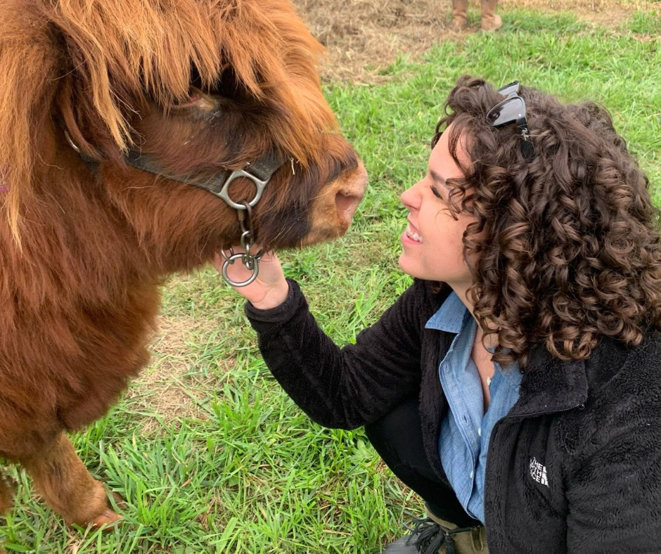 Emily and a Highland Cow Calf