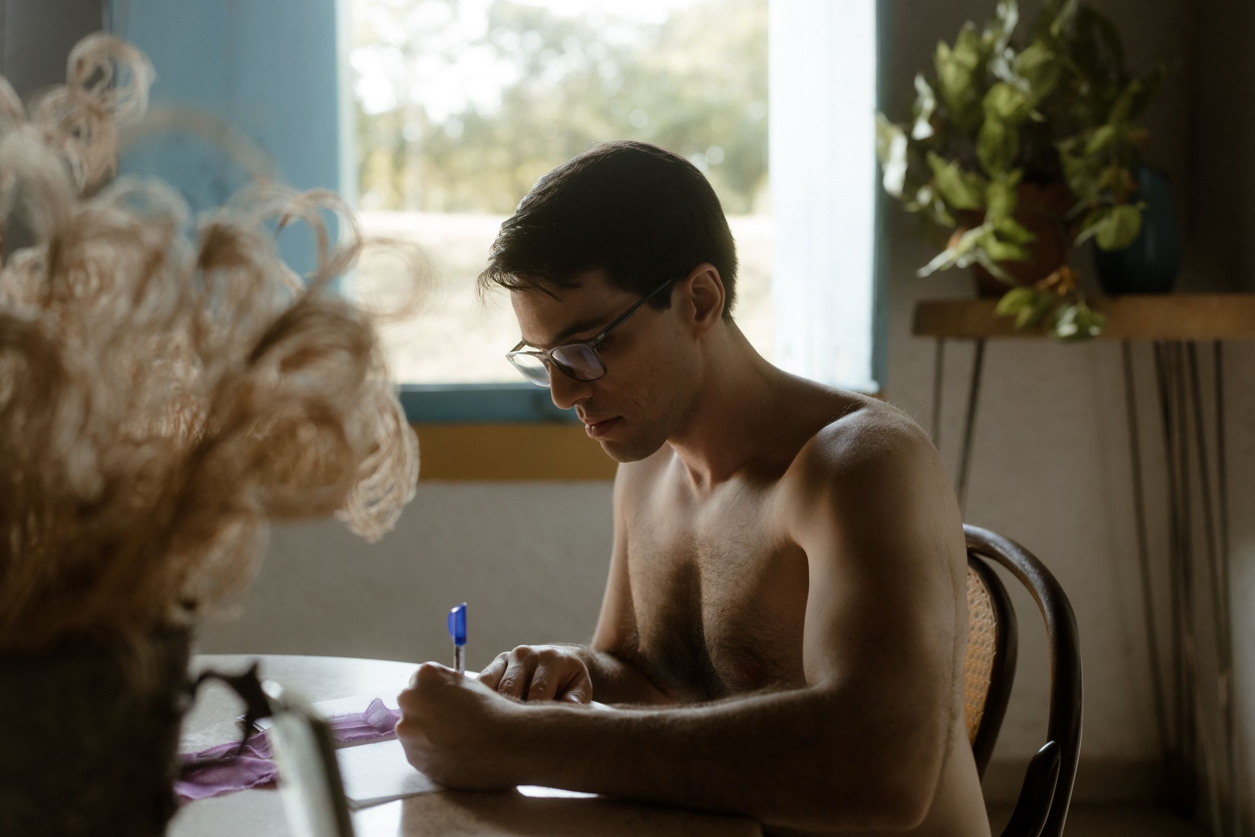 Intimate wedding day moments captured in dreamy window light.