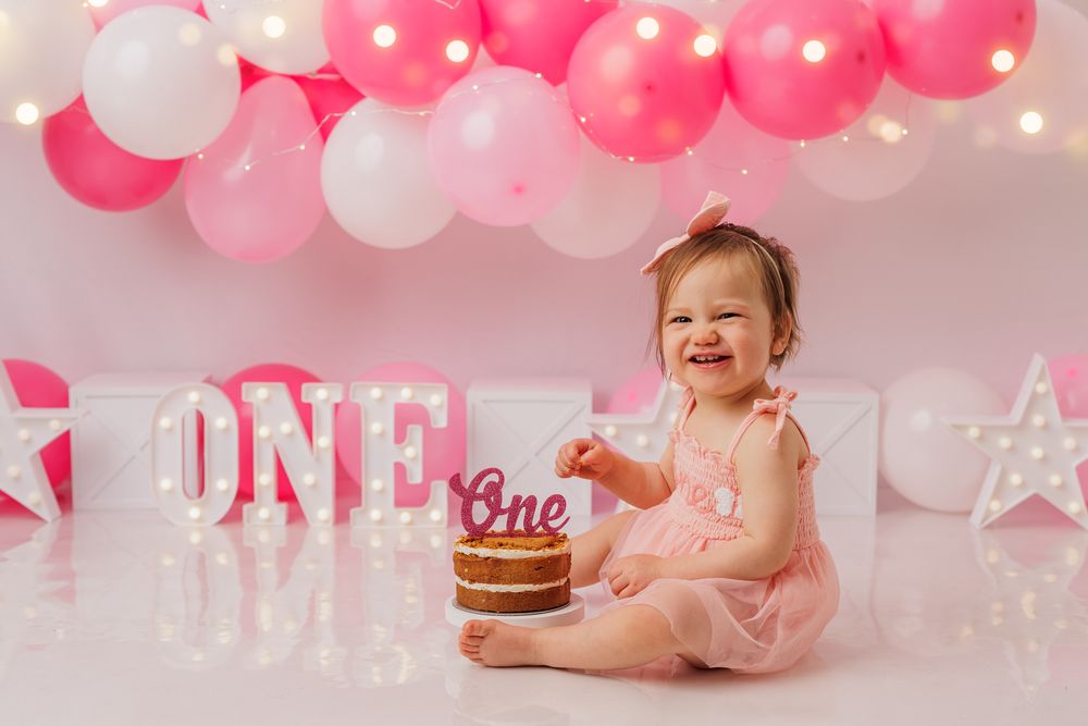 Pink and white themed Cake Smash photos in Wellington and Porirua