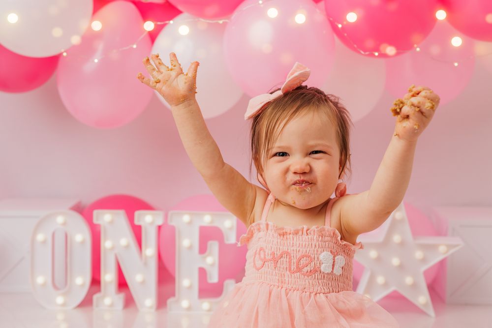 Pink and white themed Cake Smash photos in Wellington and Porirua