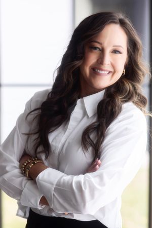 Professional portrait series showing dynamic poses in a white button-down shirt against a bright interior setting.