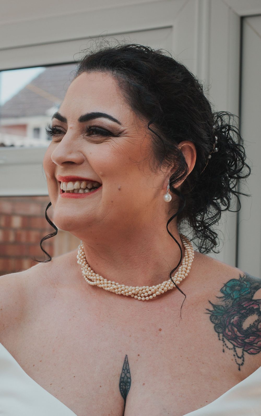 Candid smiles from the bride at Portsmouth wedding by Shayla Bloom Photography