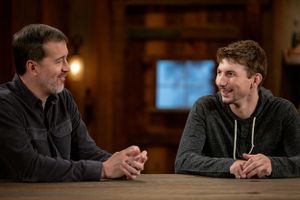 Two people engaged in conversation while sitting at a wooden table with warm lighting.
Commercial Photography
Gold Rush