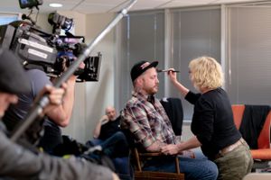 Behind-the-scenes photo of a film crew with cameras and makeup artists at work.
Commercial Photography
Gold Rush