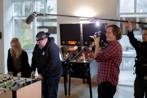 Film crew members working with cameras and equipment near a foosball table in a bright room.
Commercial Photography
Gold Rush