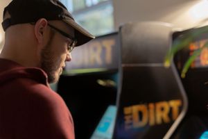 Side view of someone playing an arcade game in dim lighting.
Commercial Photography
Gold Rush