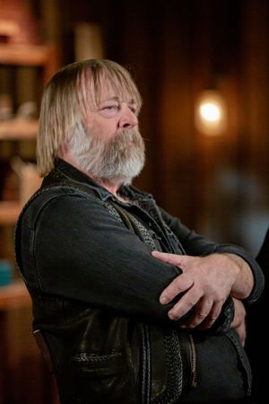 Person with long blonde hair and beard wearing black leather jacket in dimly lit room.
Commercial Photography
Gold Rush