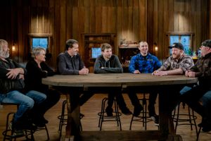 People engaged in conversation while seated at round table in rustic interior.
Commercial Photography
Gold Rush