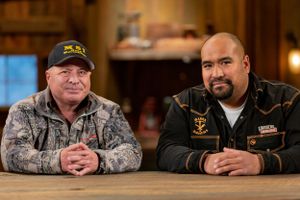 Two individuals seated at a wooden table wearing casual clothing during what appears to be an interview setting.
Commercial Photography
Gold