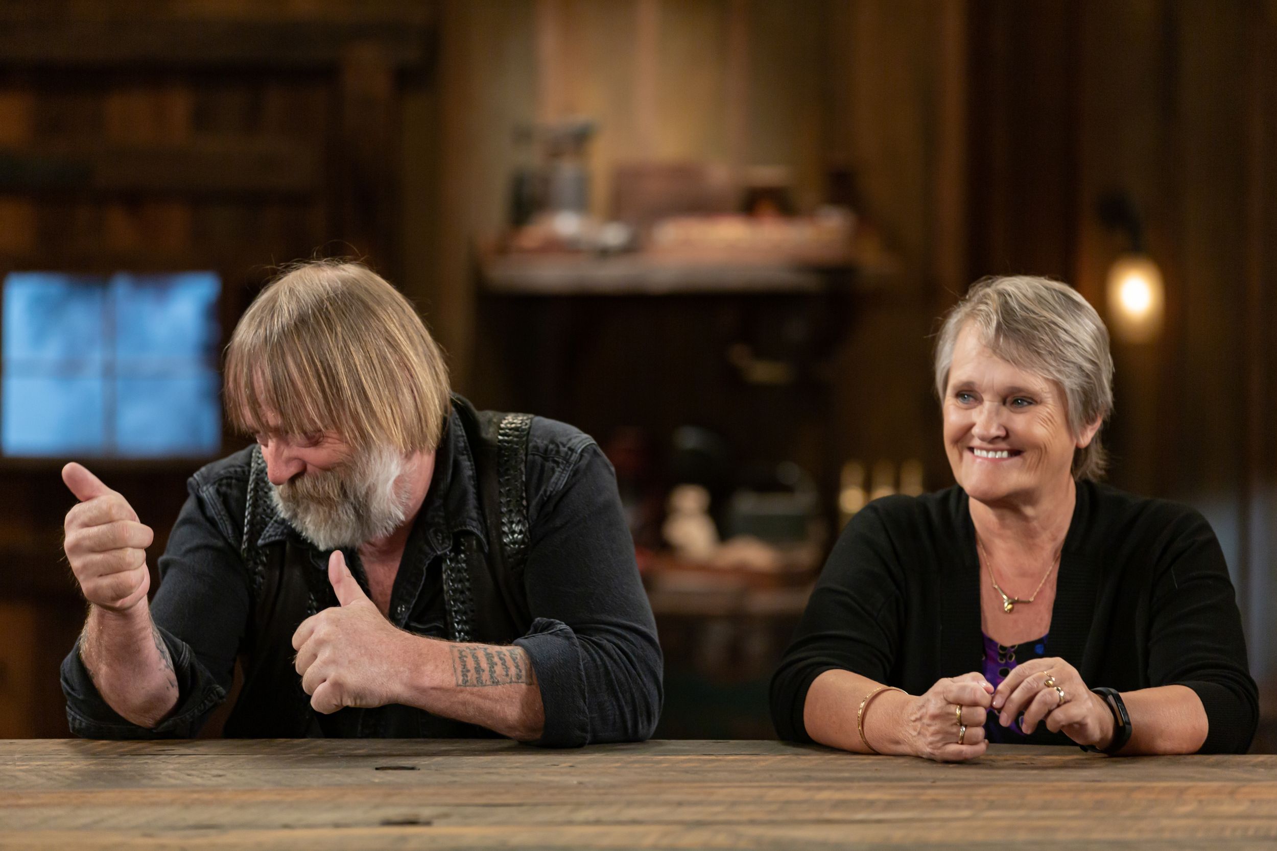 Two people share a lighthearted moment while being interviewed at a wooden table.
Commercial Photography
Gold Rush