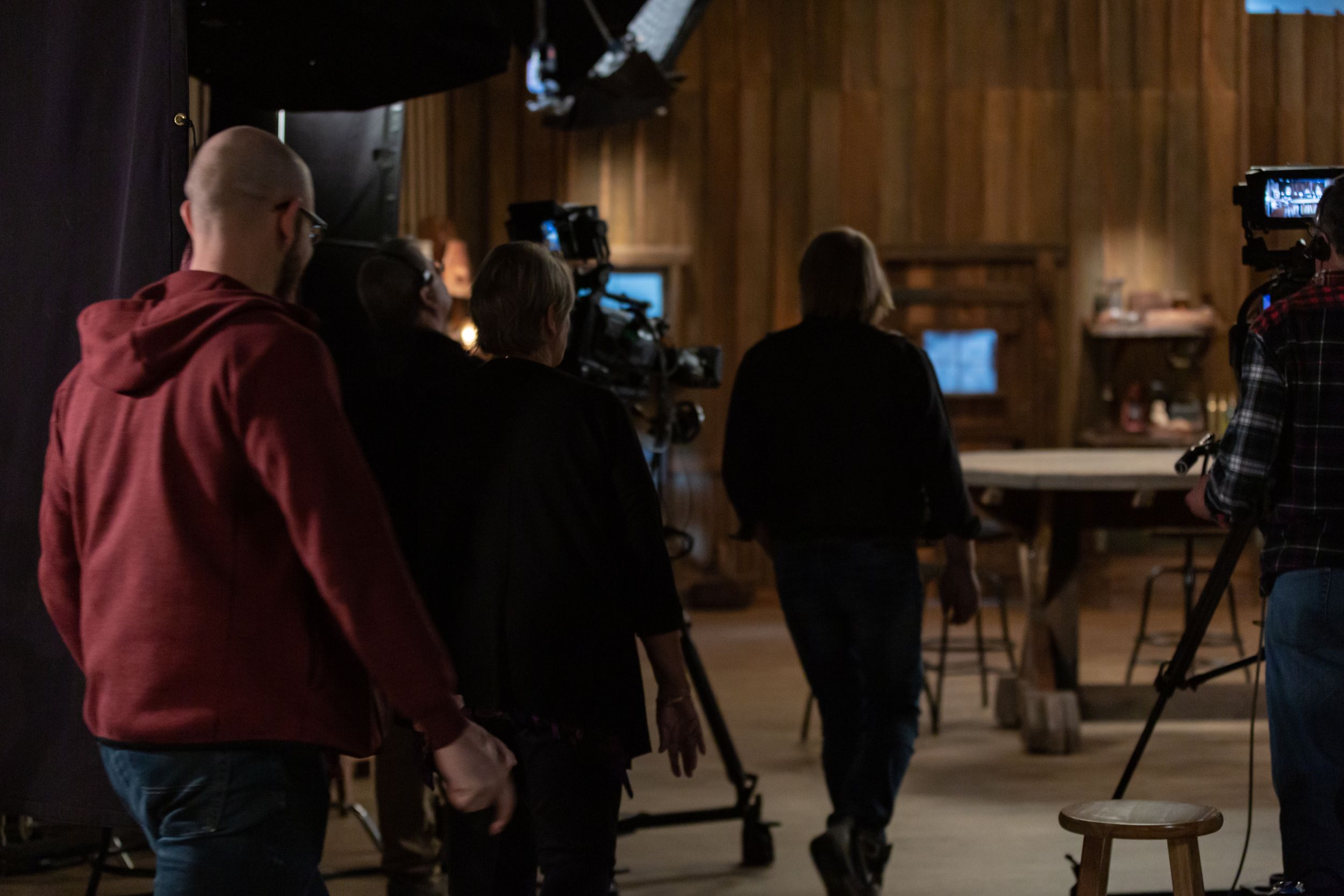 Film crew working in dimly lit wooden interior with cameras and equipment.
Commercial Photography
Gold Rush