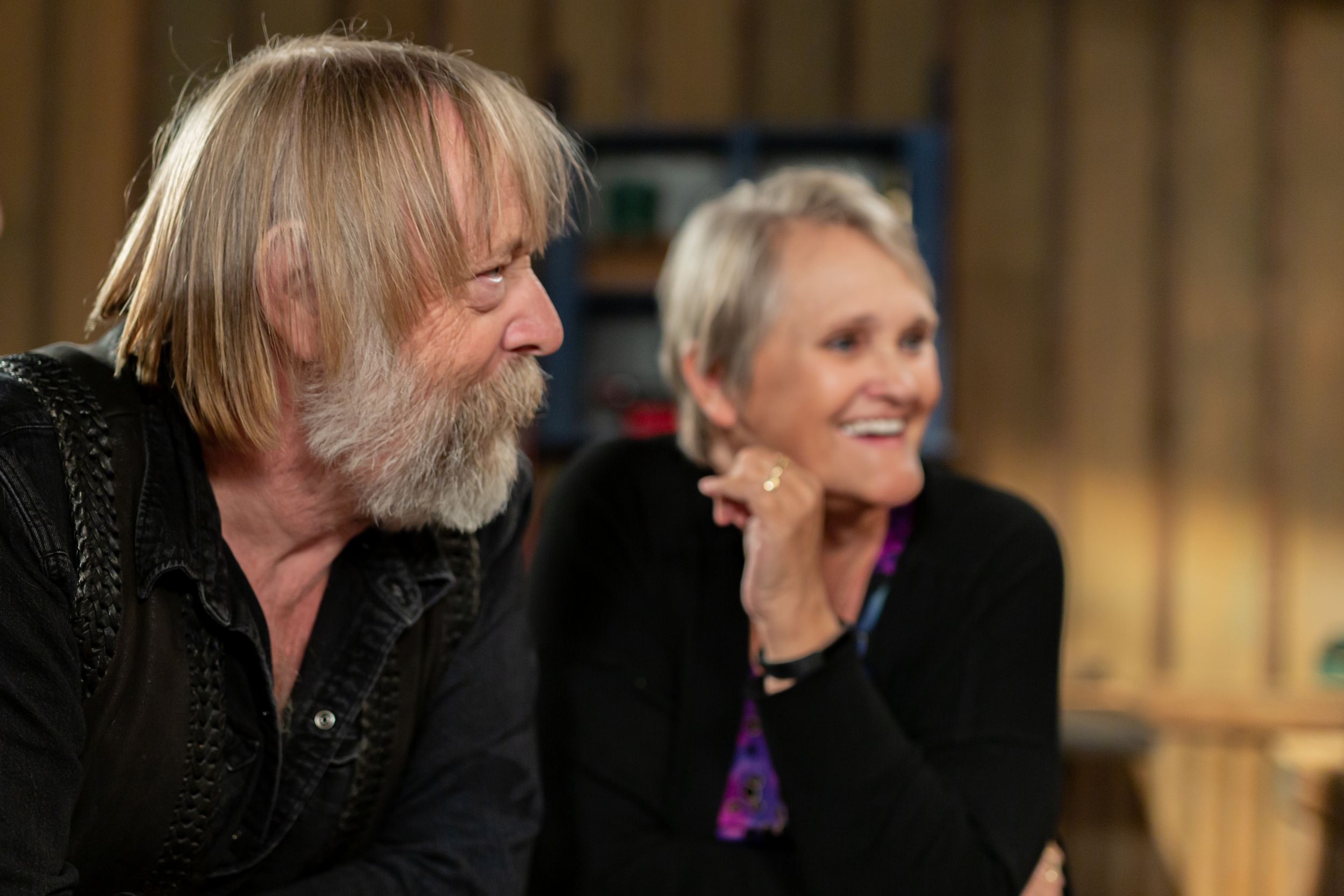 Two people engage in animated conversation during an interview in a wood-paneled room.
Commercial Photography
Gold Rush