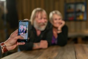 Someone takes a phone photo of two people posing at a wooden table during an interview.
Commercial Photography
Gold Rush
