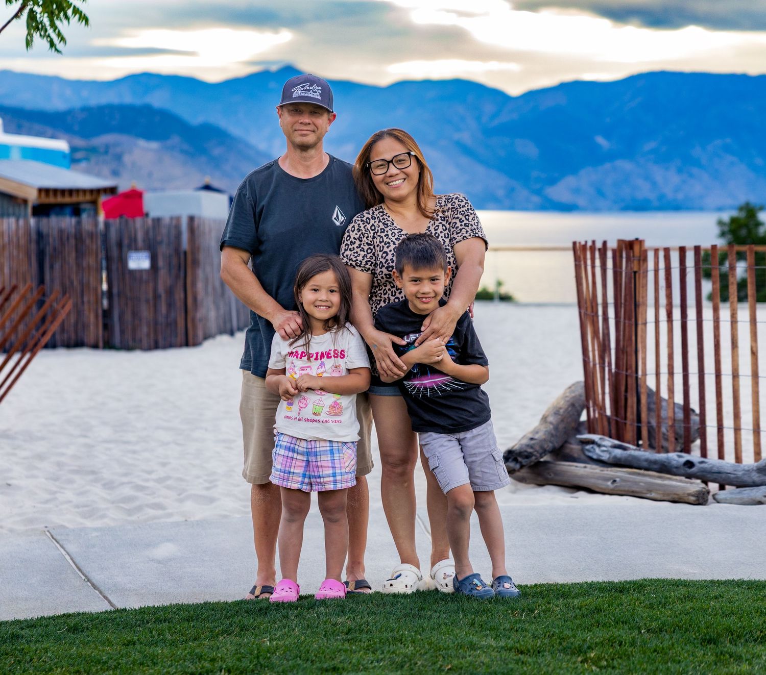 Family portrait in front of lake