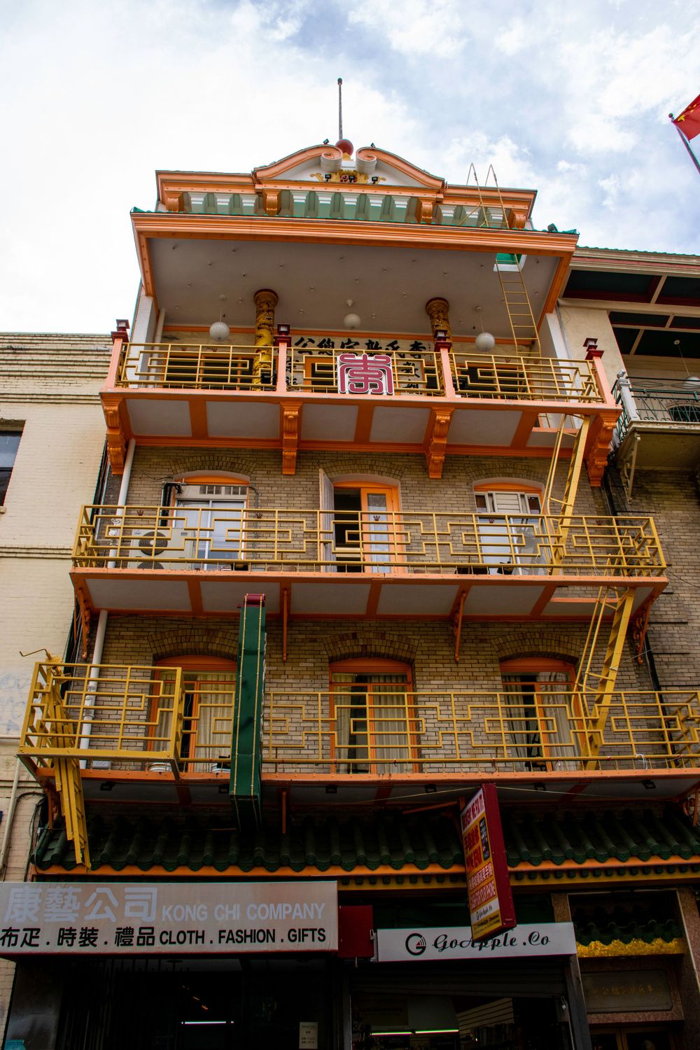 Traditional Chinese building facade with ornate balconies and architecture in Chinatown.
