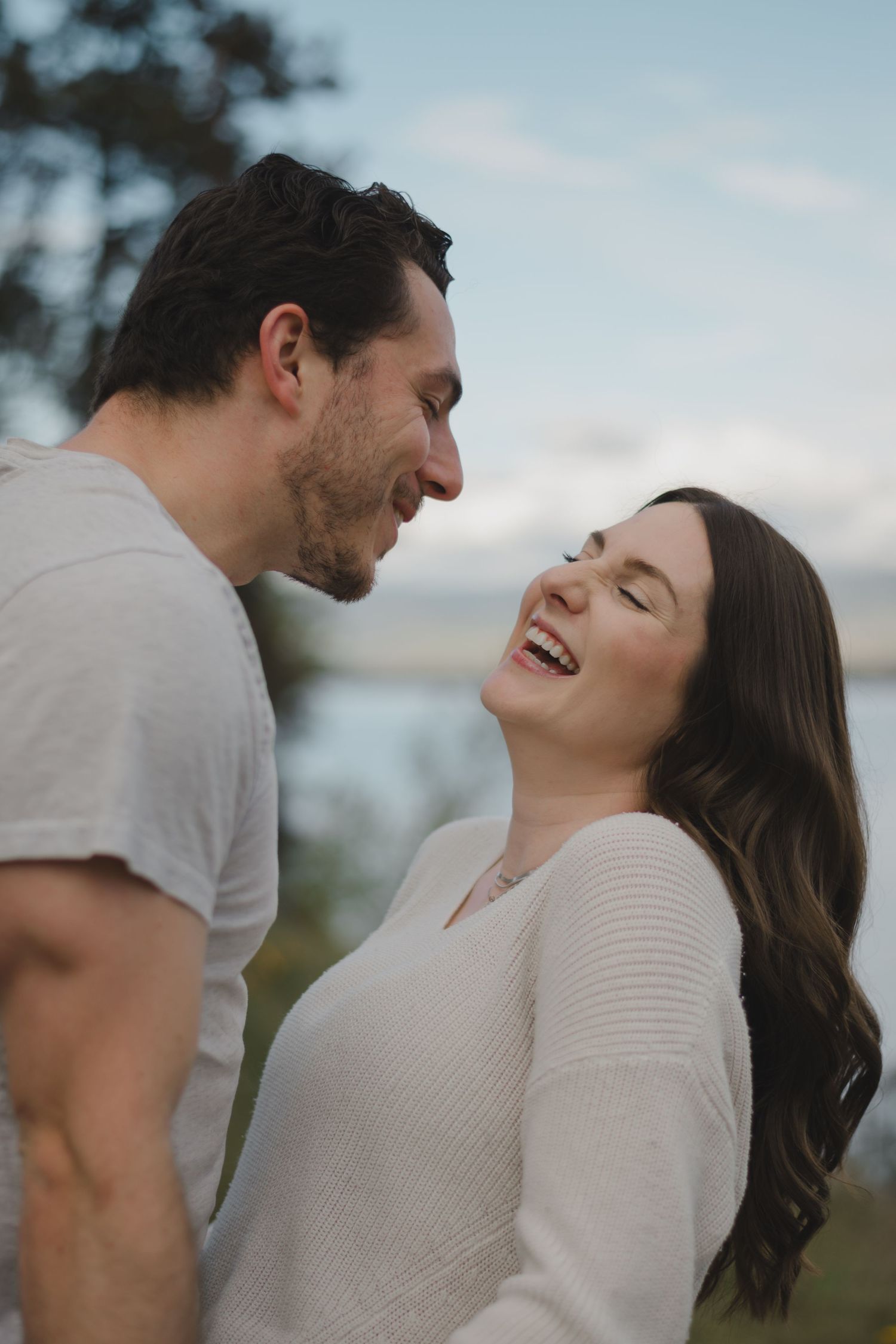 husband and wife laughing