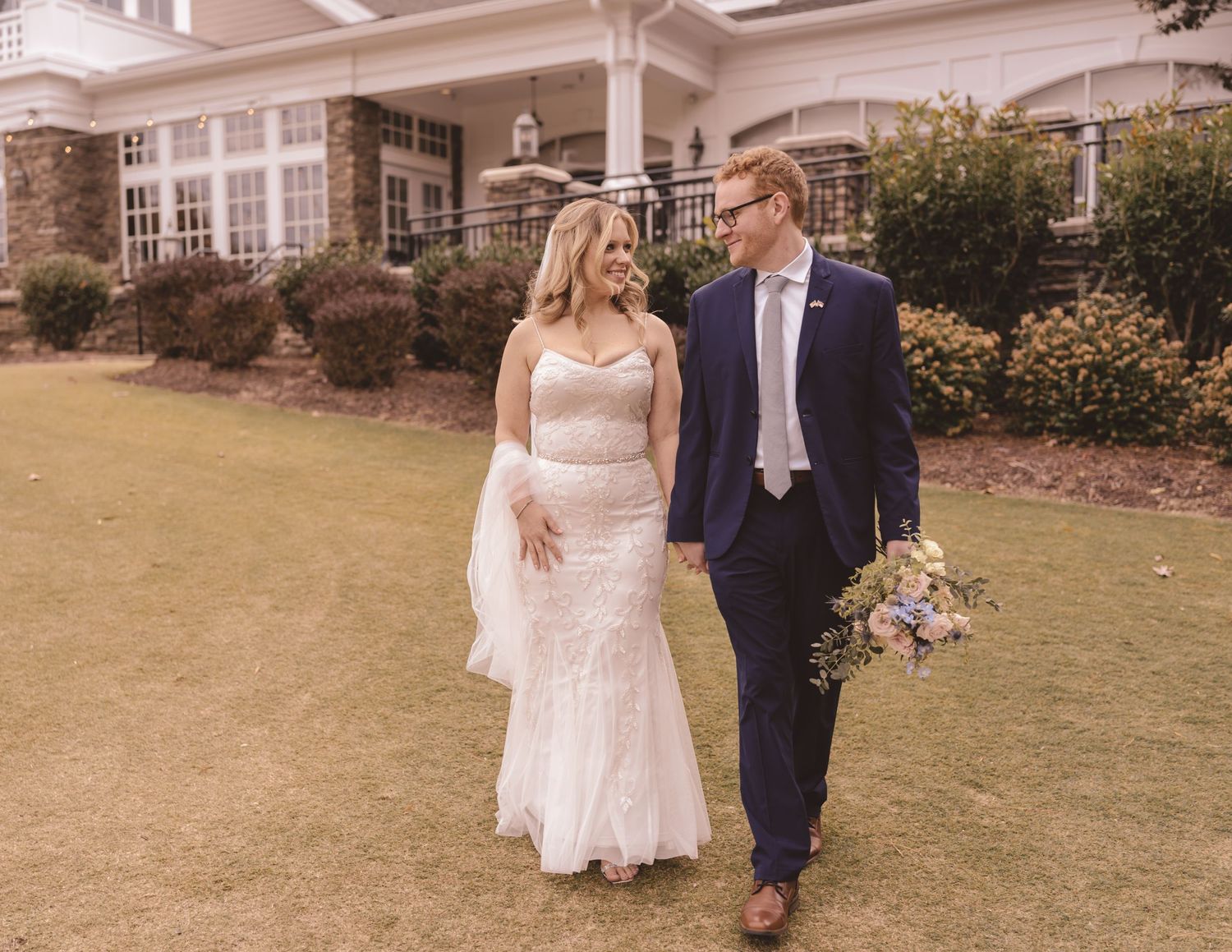 bride and groom share a first look on their wedding day at chapel hill country club, chapel hill wedding photographer