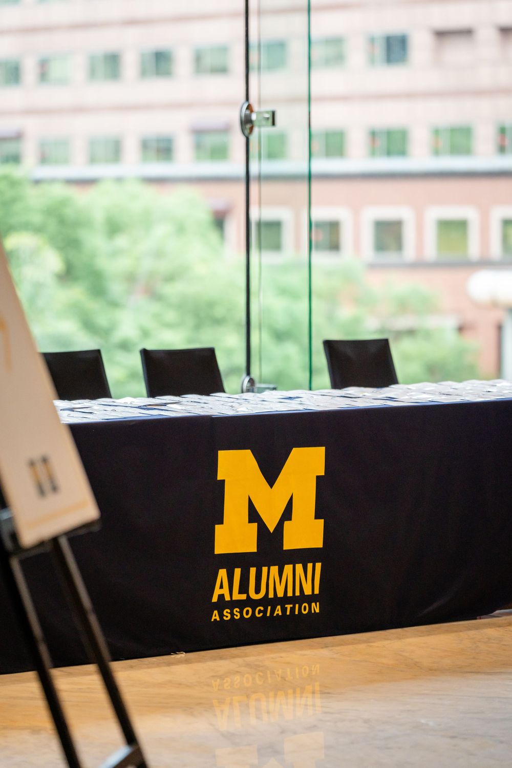 welcome booth for Michigan alumni at a conference in Le Méridien Taipei