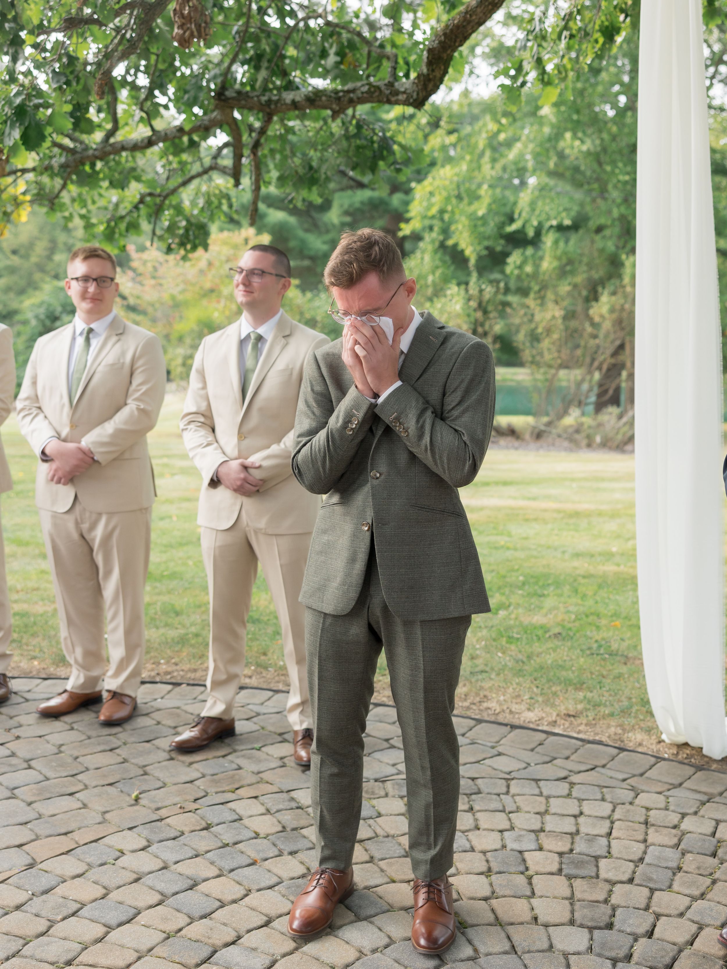 groom aisle reaction photographed by life by jude photography / judith sumner
