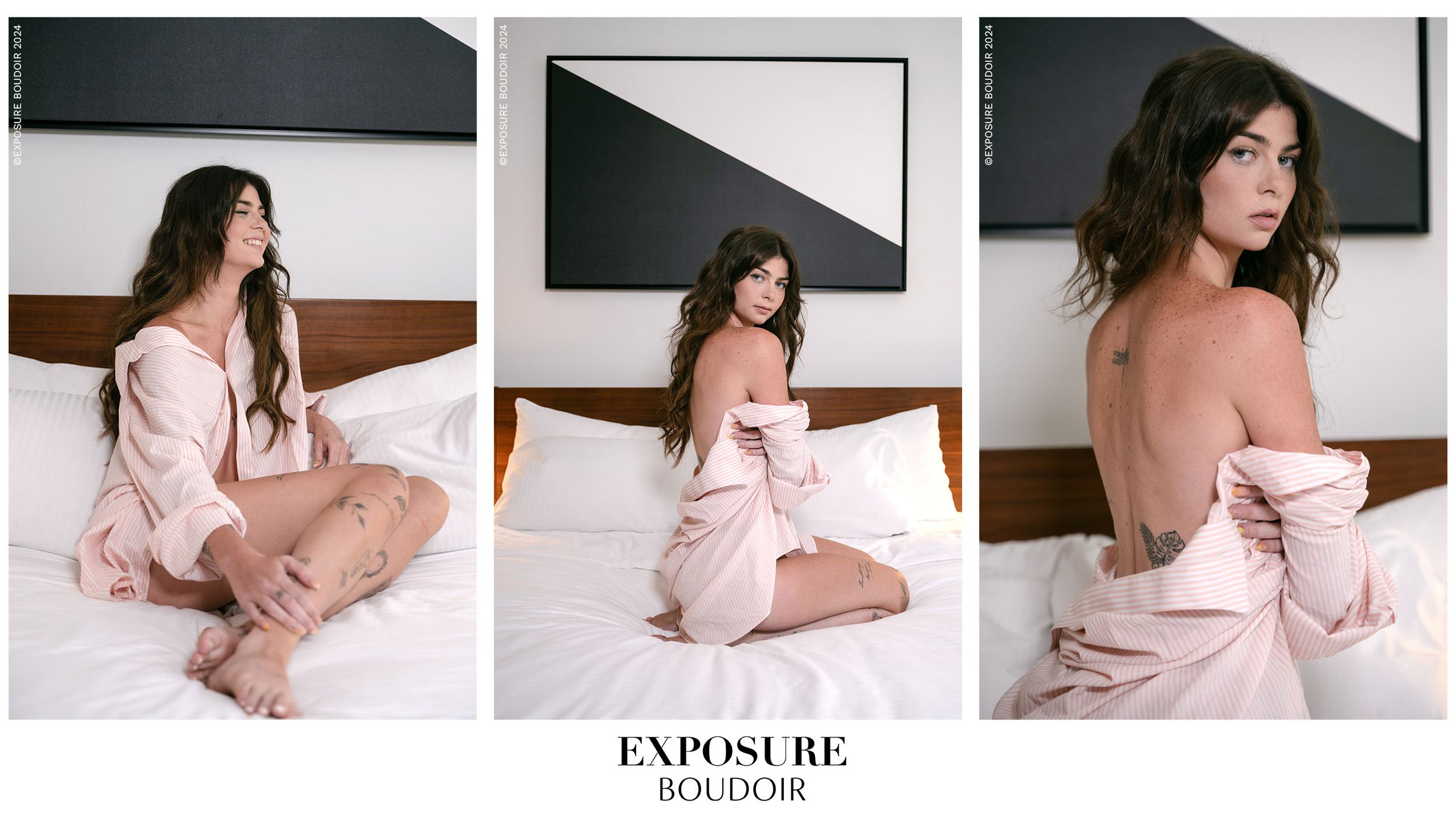 A feminine figure in a pale pink satin robe sits on a white bed against a dark wall in a boudoir style photoshoot.