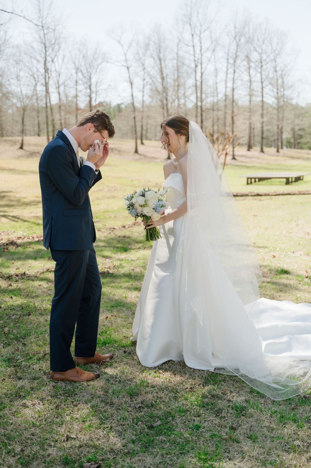 emotional groom during first look