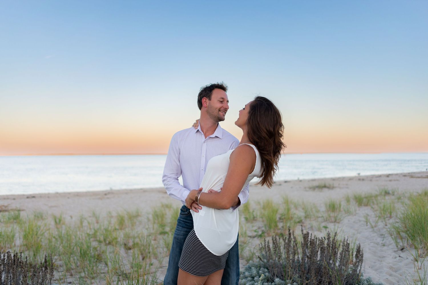 Engagement portraits on the beach at sunset on Cape Cod. Boston’s South Shore photographer, Leah Ramuglia.