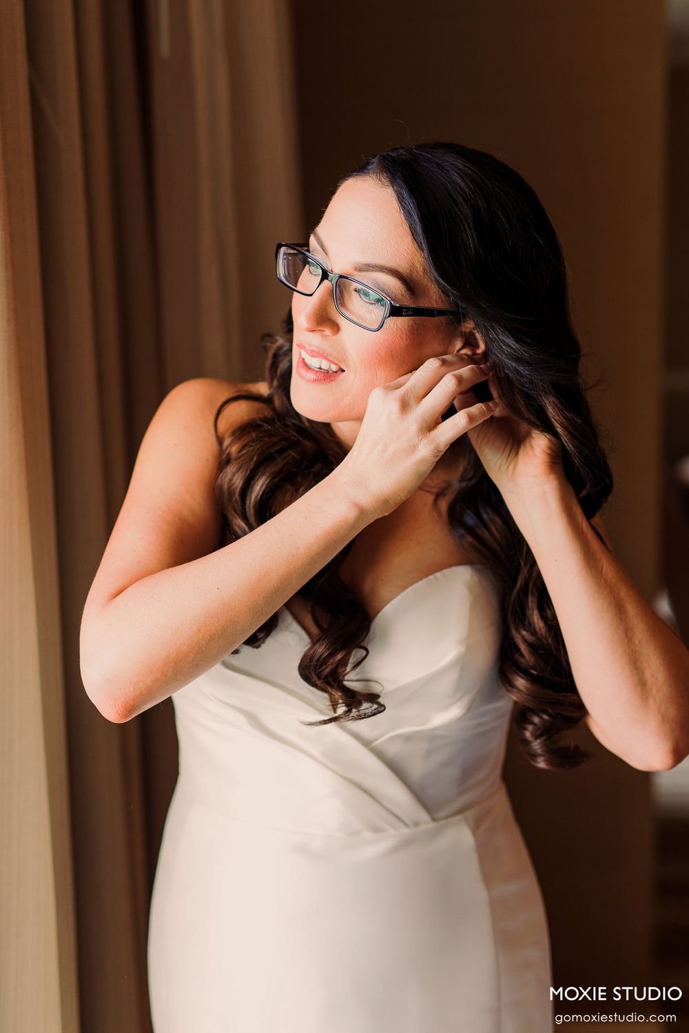 A person in a white dress makes playful expressions in a sequence of candid portrait shots.