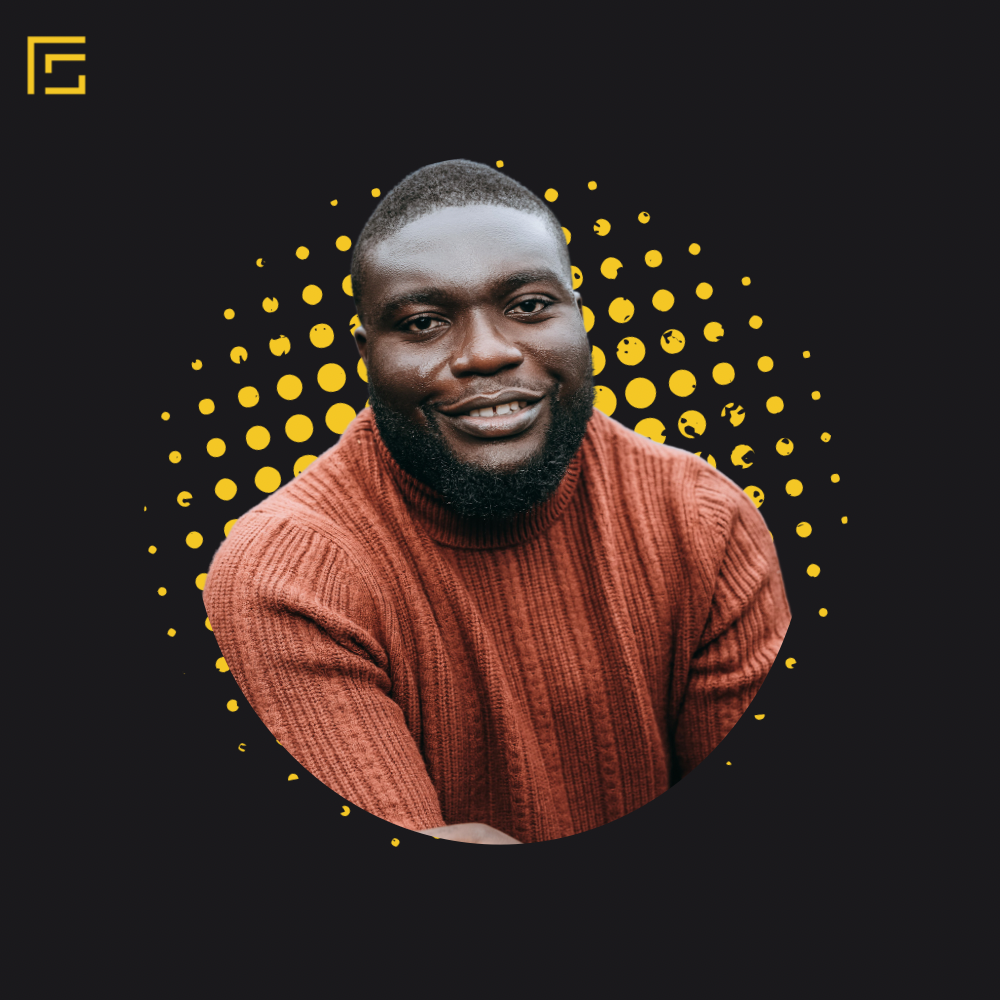 Smiling person wearing burnt orange sweater against black background with yellow polka dot pattern circle frame.