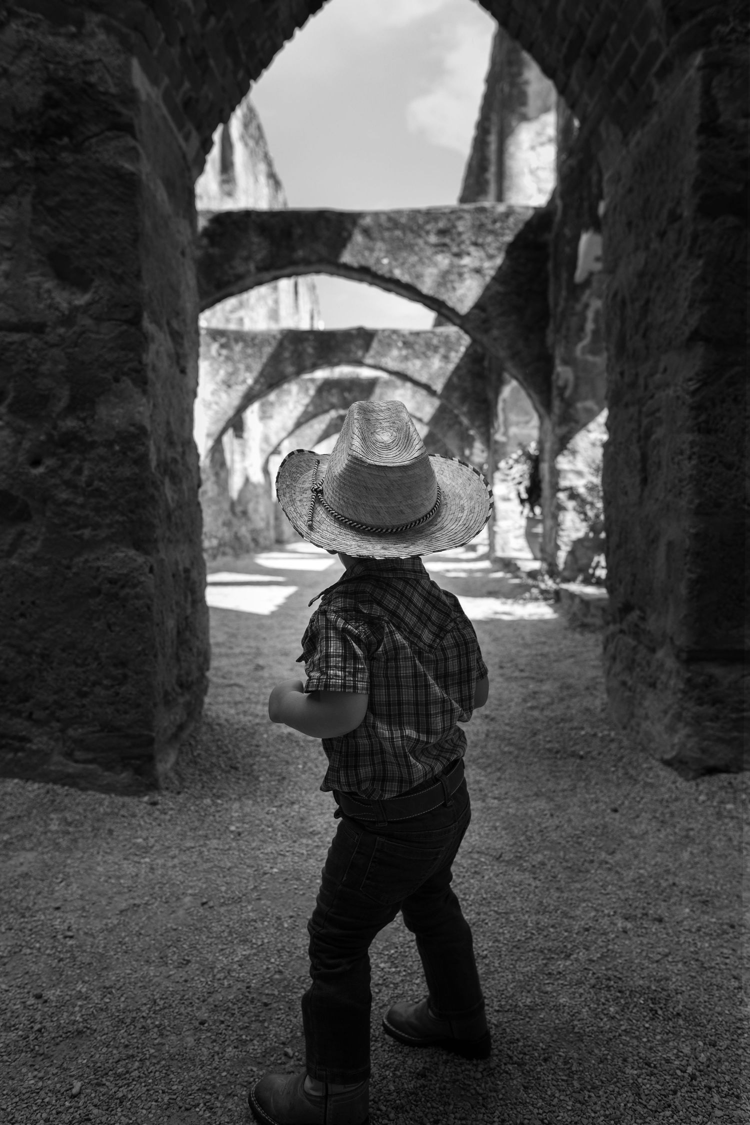 kid looking at mission family portraits