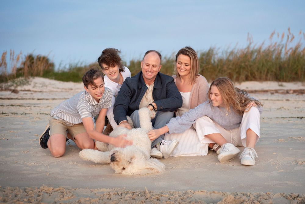 Large family of 5 and large pet photo session at sunset together in the sand. New Smyrna Dunes Park - Dog Side