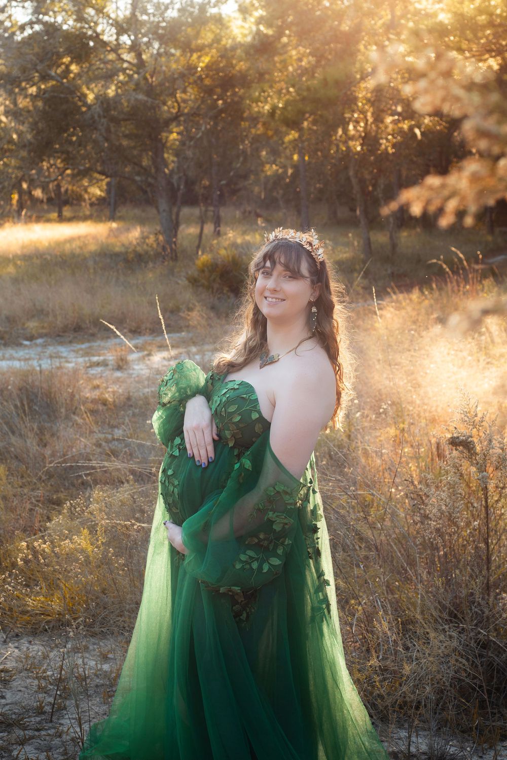 Solo maternity session themed to ACOTAR with natural lighting at Lake Louisa State Park golden hour