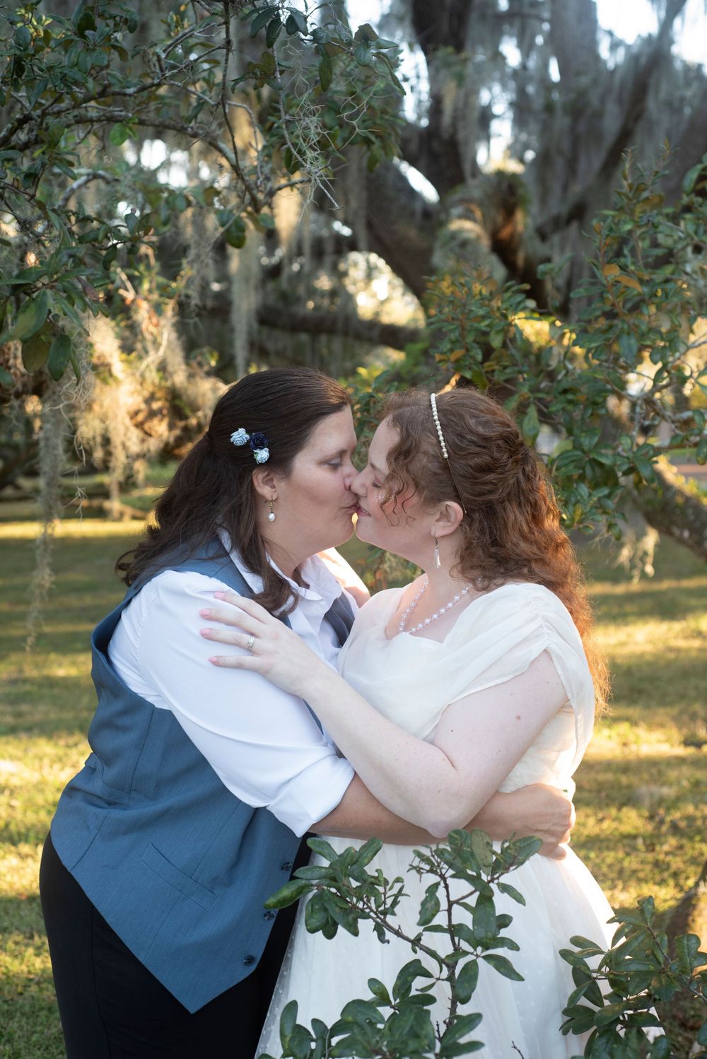 Same sex lesbian brides wedding portrait session at Loch Haven in Orlando. Natural lighting soft and elegant