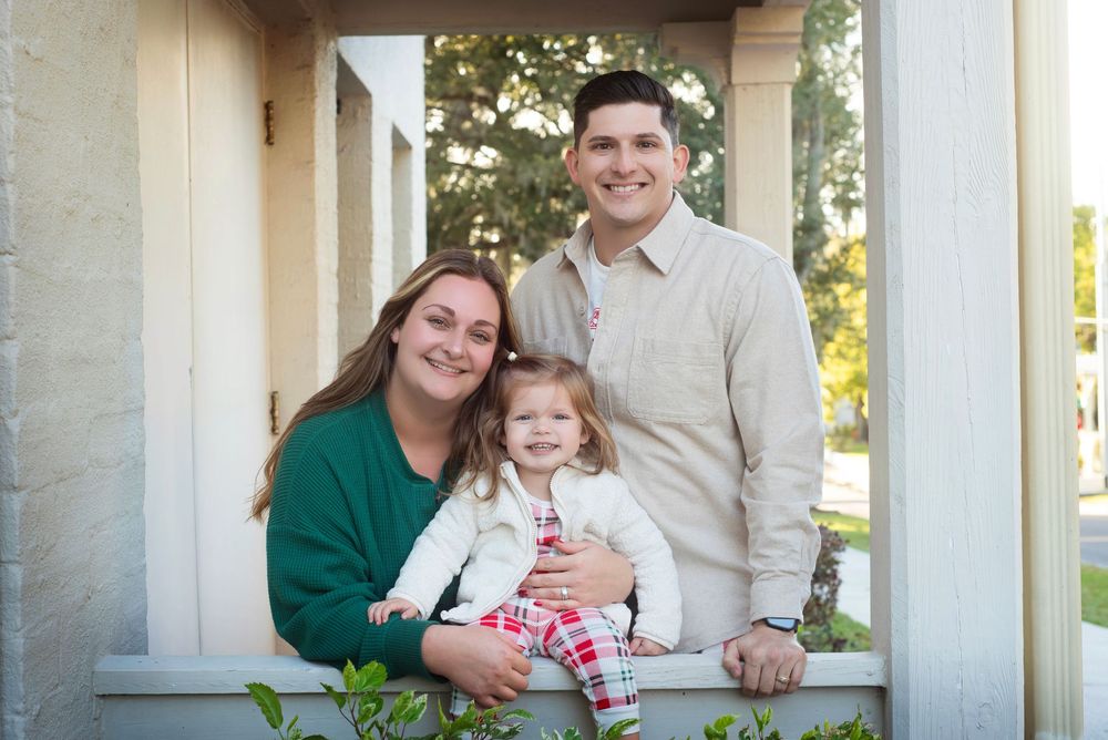 Family session with child in golden hour lighting