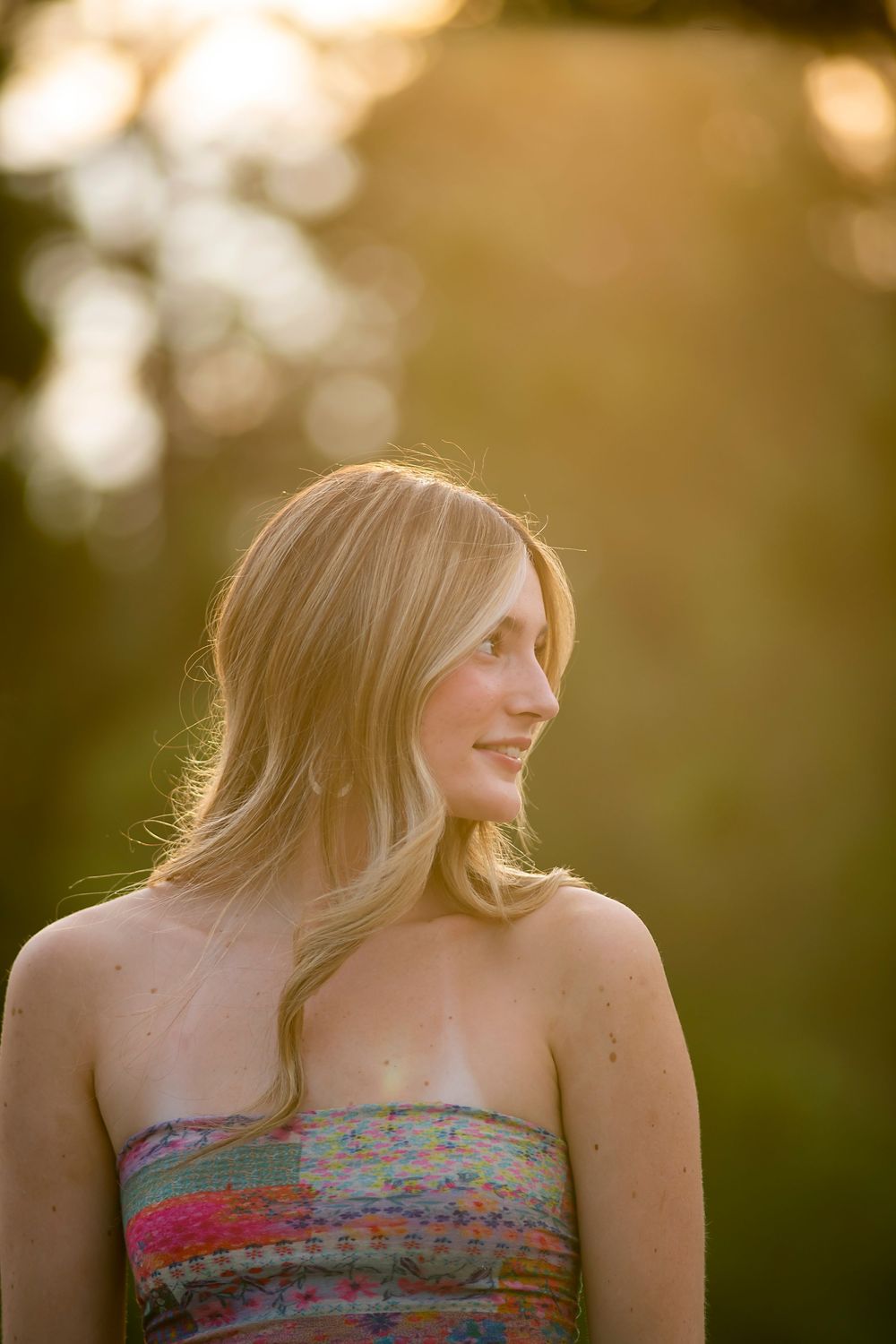 Natural light senior portrait by Hannah Sons Photography at Hayden Lake Idaho.