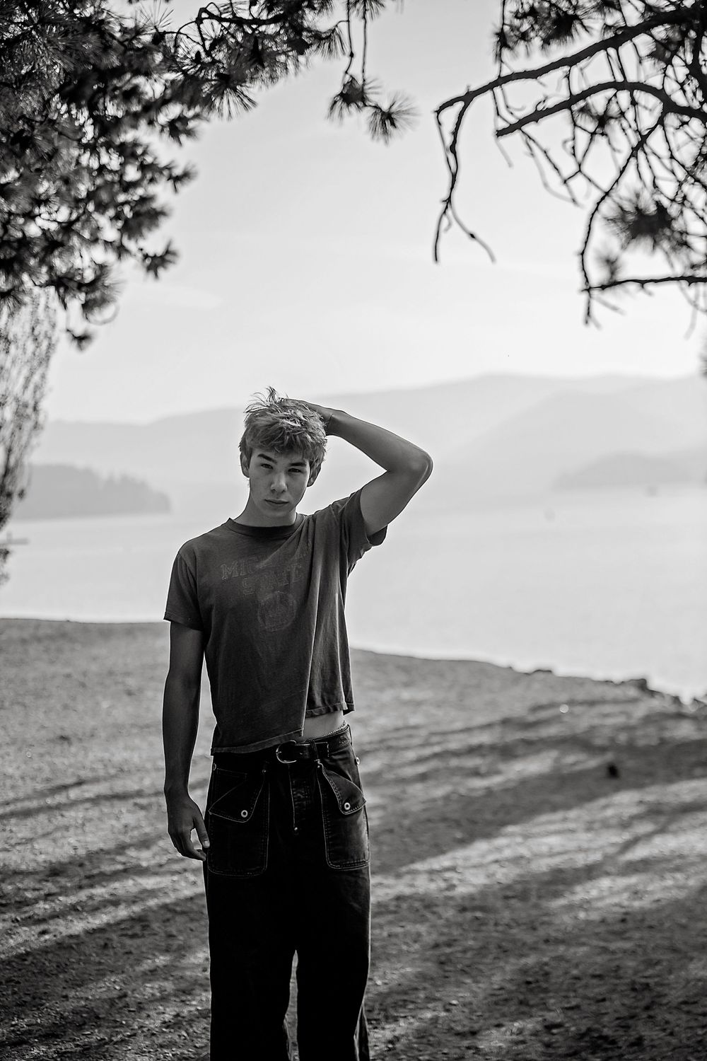 senior portrait by Hannah Sons Photography at Hayden Lake Idaho. Black and white portrait. Black and white portrait. Boy senior picture