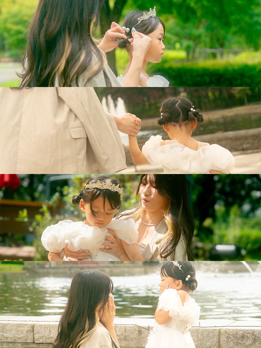 A woman places a floral crown on a young girl near a fountain in a lush green park setting.