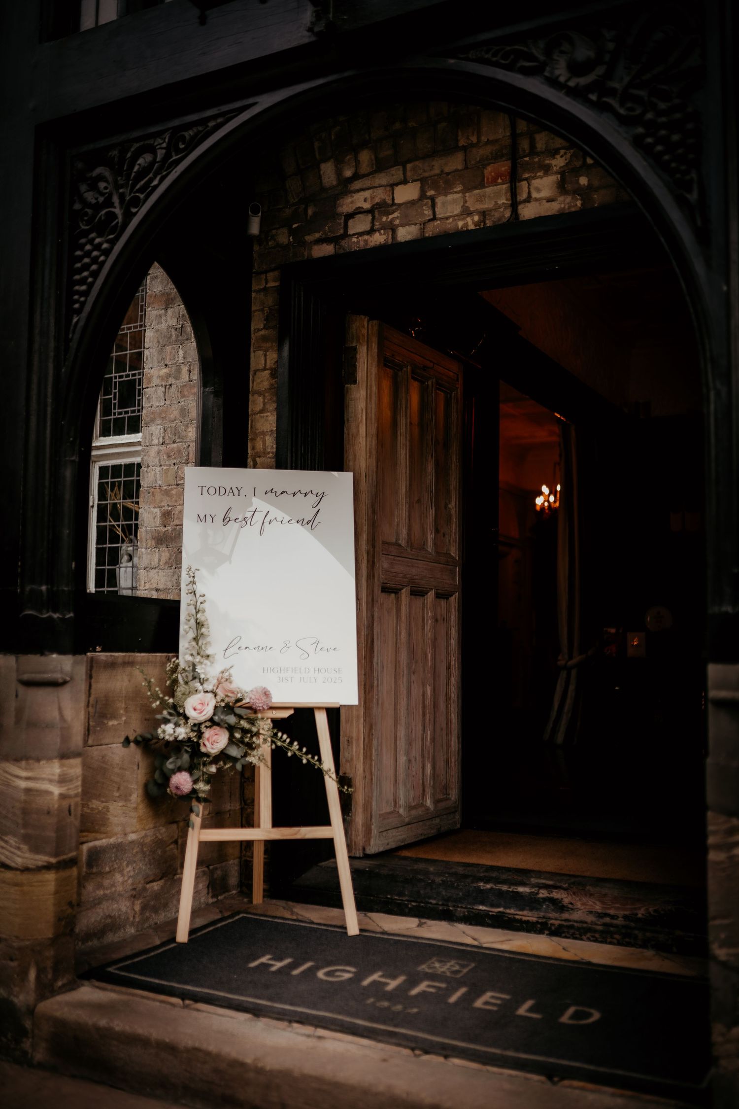 elegant table setup in the grand hall at highfield house with lots of candles