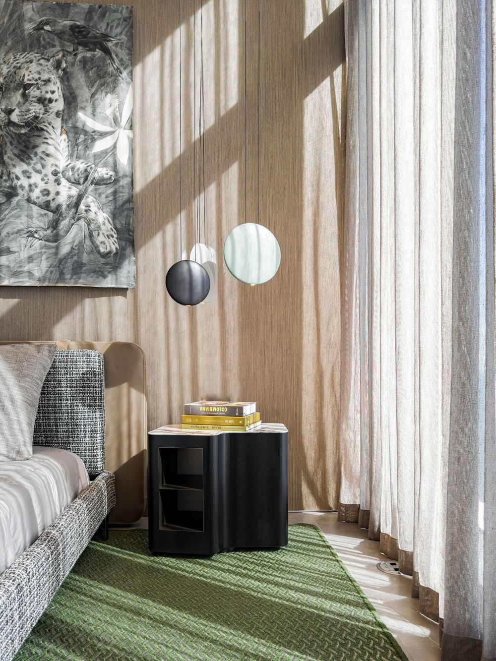 Modern bedroom interior with white curtains, green carpet, and minimalist decor creating a serene atmosphere.